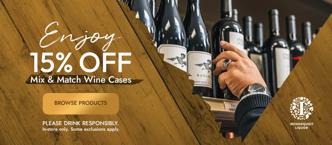 Hand reaching for a wine bottle on a shelf; text offers 15 off mix match wine cases.