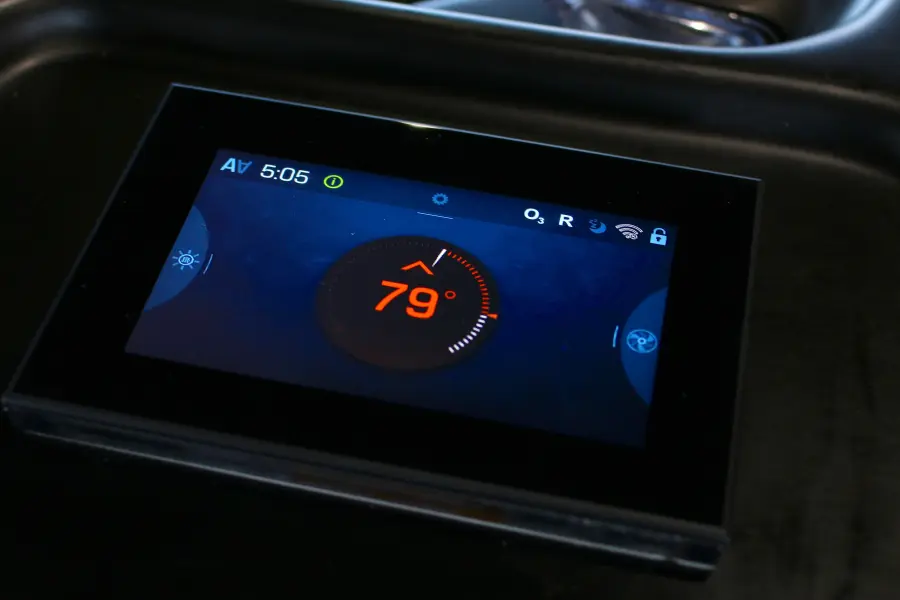 Midnight Series touchscreen control panel showing water temperature