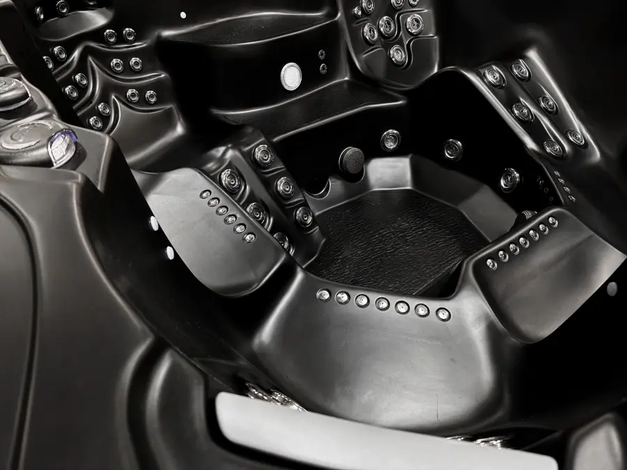 Detail of Bold Luxurious Black acrylic seating and hydrotherapy jets
